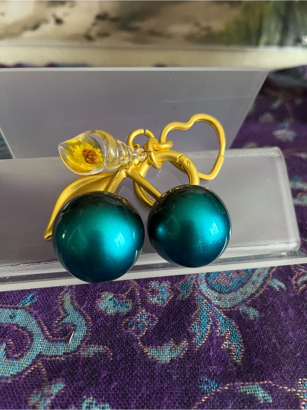Gold-Tone iridescent teal cherry keychain/bag charm